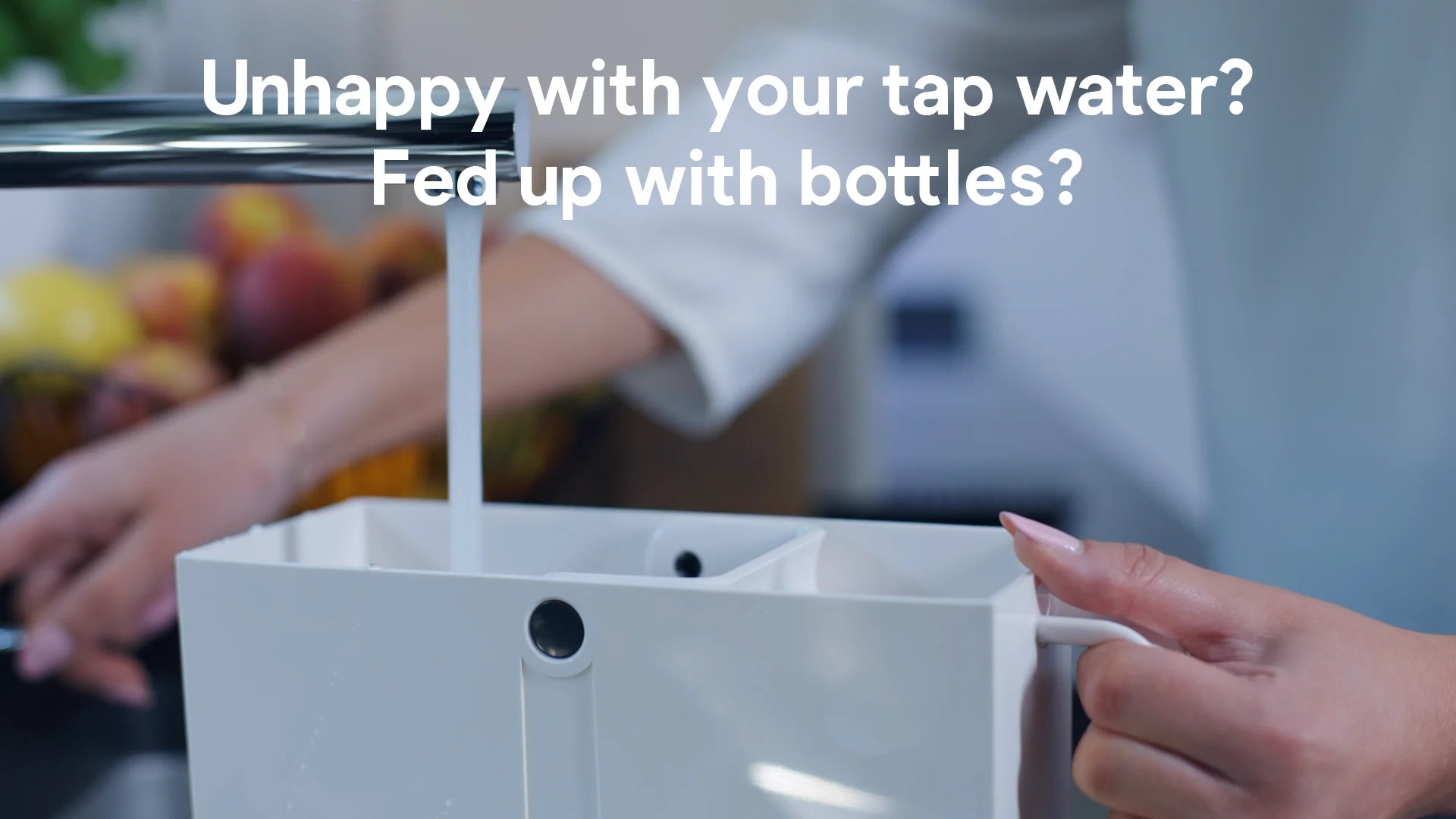 UNHAPPY WITH YOUR TAP WATER? woman using a water filter system with tap water