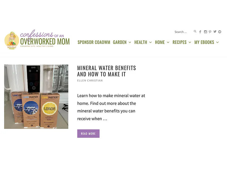 A webpage featuring a water dispenser. Next to the dispenser are two bottles of mineral water, A and B, and a bottle of Langwater Lemon. The page also includes an informational text about the benefits of mineral water and the water production process.